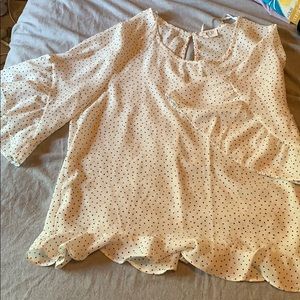 Black and white polka-dot blouse